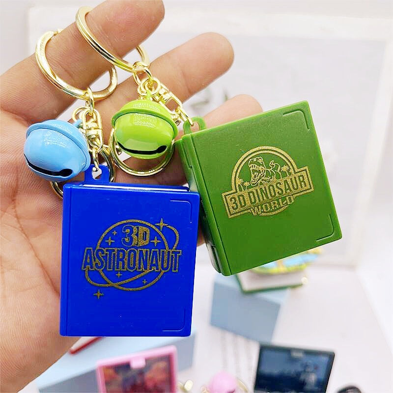 Wholesale 3D Stereo Explosive Book Magic World Magic Book Plastic Keychains